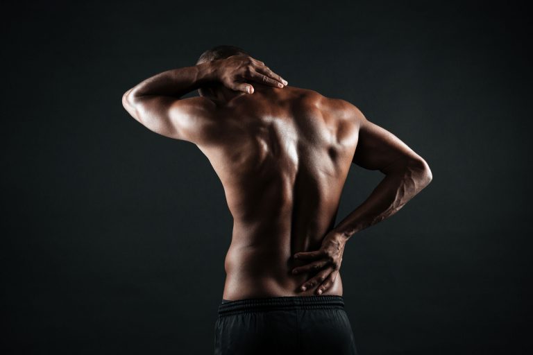 Fitness, Rücken eines muskulösen Mannes, Dysbalancen, Rückenschmerzen